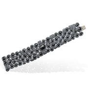 Todd Reed bracelet with Fancy cut black diamonds(~68.01ct), black brilliant cut diamonds(~2.56ct), silver brilliant cut diamonds(~5.14ct), sterling silver with patina.